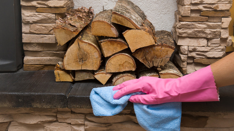 Cleaning bricks around fireplace