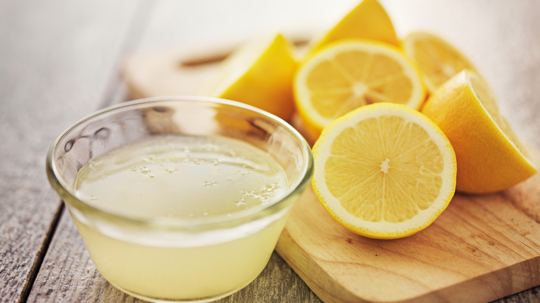 lemon juice on cutting board 