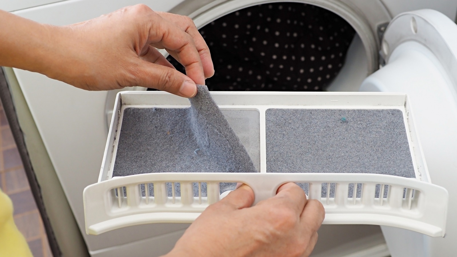 Cleaning Your Dryer's Lint Trap Is So Much Easier With This Genius