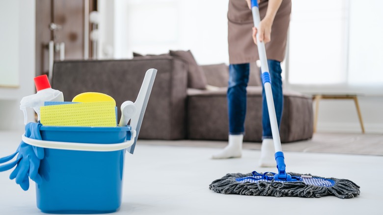Woman cleaning floors