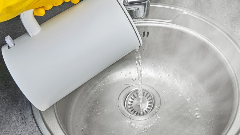 Boiling water poured down drain 