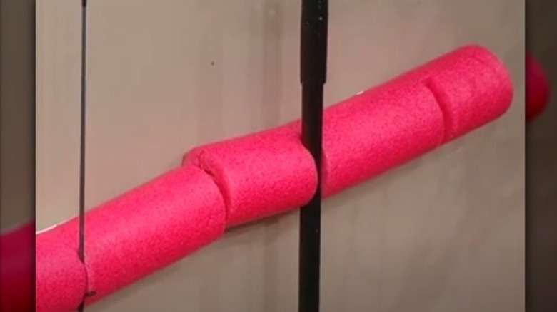 Pool noodle garage organizer DIY