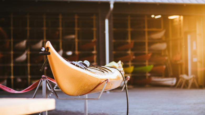 Yellow kayak in storage facility