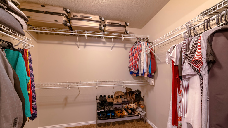 The type of metal closet shelves that are often poorly fitted and keep falling