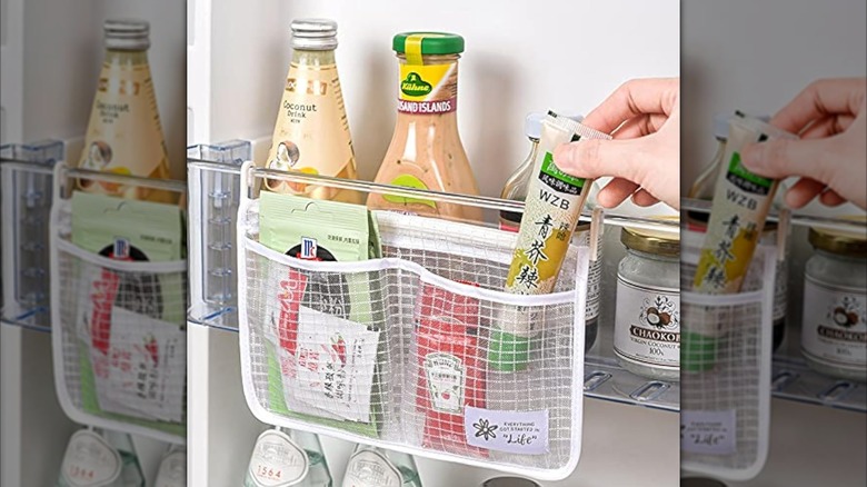 Hanging mesh bag as added storage inside fridge door