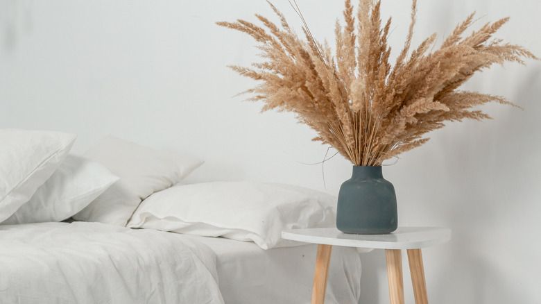 pampas grass in blue vase