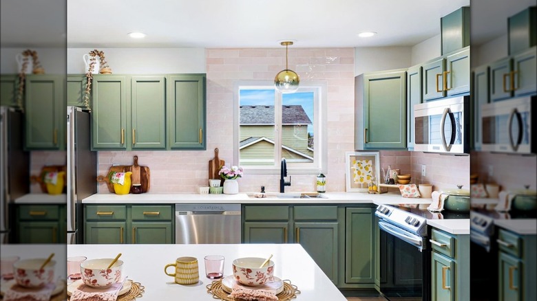 bright kitchen with metallic finishes 