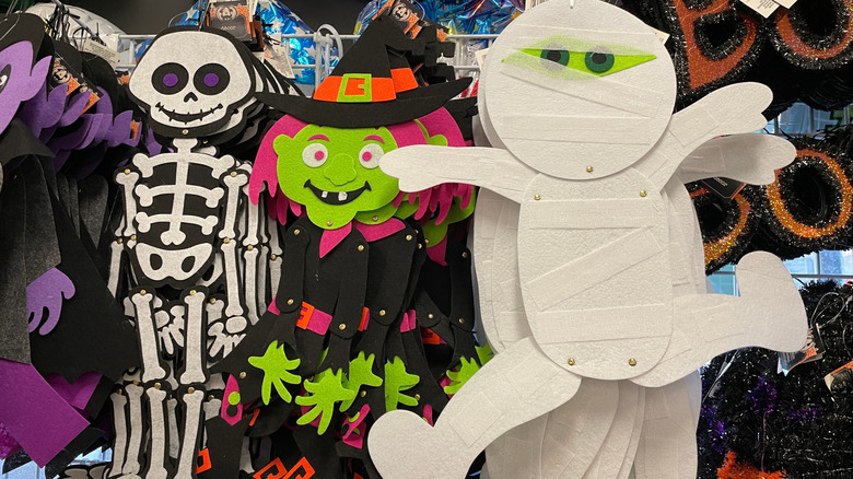 Cute Halloween decorations are displayed at a Dollar Tree store.