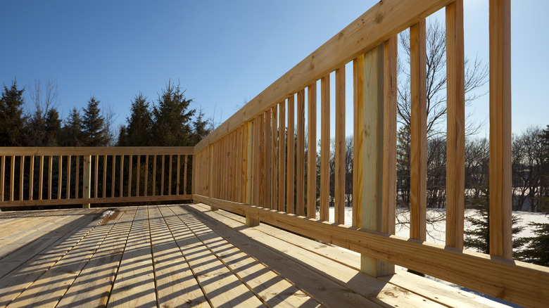 Unstained wooden deck in winter