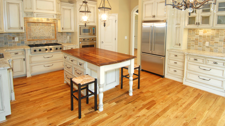 person walking on wood floors