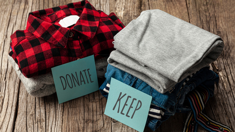 donate and keep clothes pile