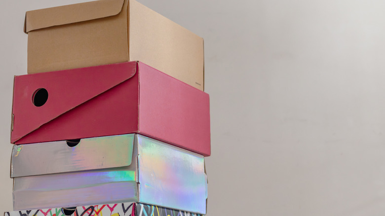 Pile of shoeboxes stacked up.