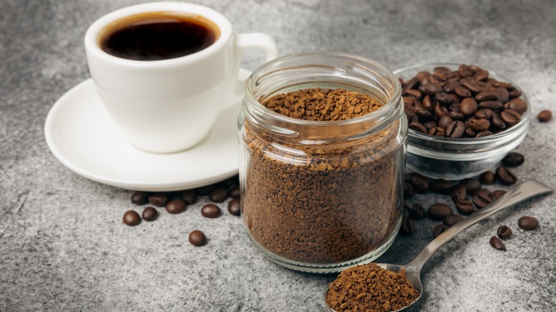 coffee cup beans and grinds