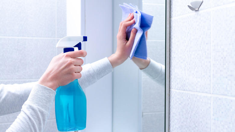 using glass cleaner on mirror