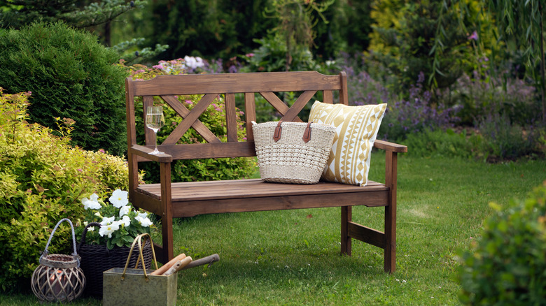 Wooden bench in a garden with plants