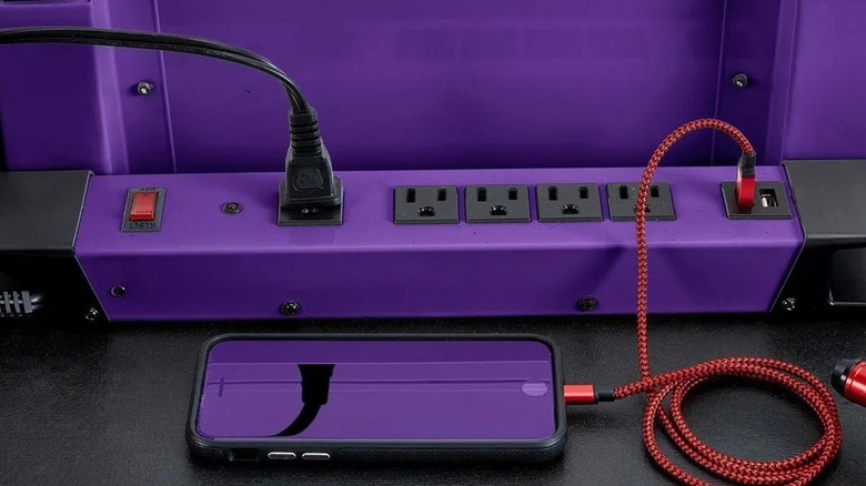 Electrical cords plugged into a U.S. General power strip