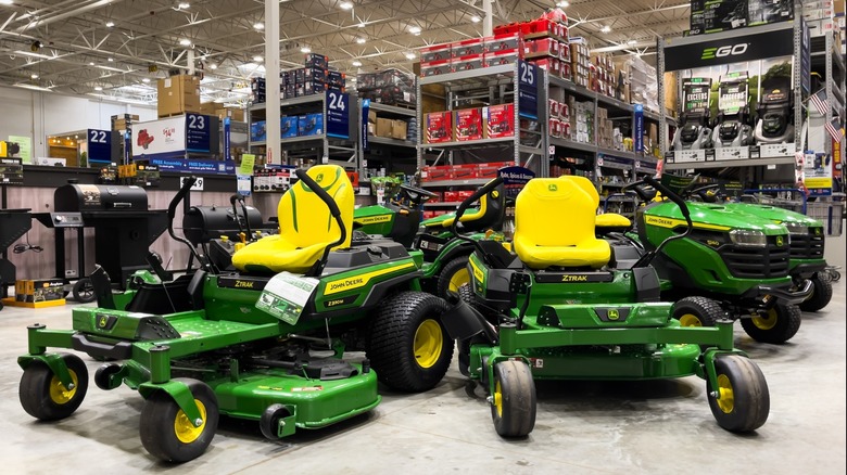 John Deere mowers on display at a retail store