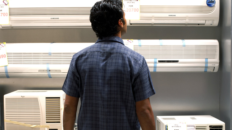 A man shops for a new Ac unit in store