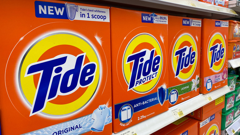 Boxes of Tide powder laundry detergent in a store.