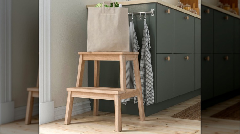 IKEA BEKVÄM step stool in a kitchen with a produce bag on top step