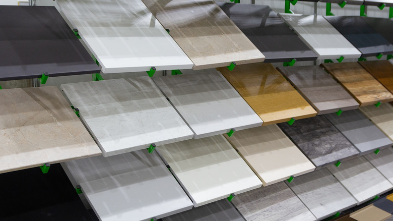 Countertop material samples displayed on shelves
