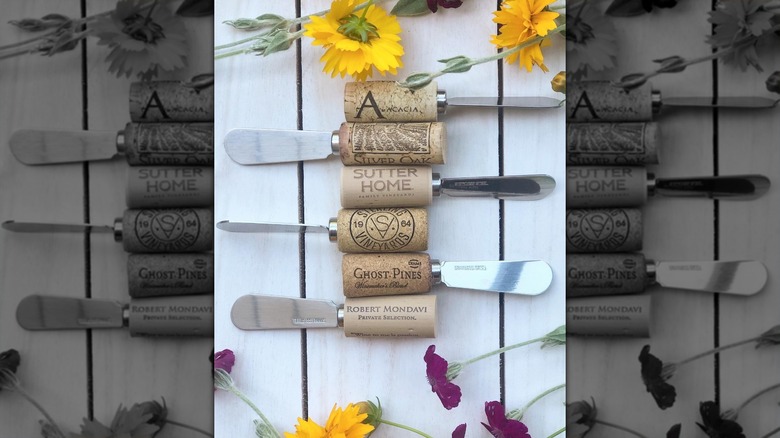Wine corks repurposed as cheese knife handles