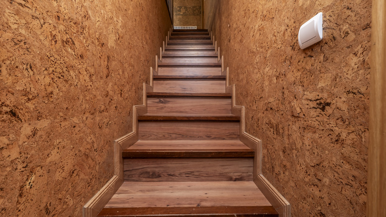 A stairwell with cork walls
