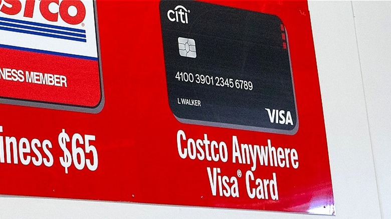 Close-up of the Costco Anywhere Visa Card seen above the customer service station at a US-based Costco