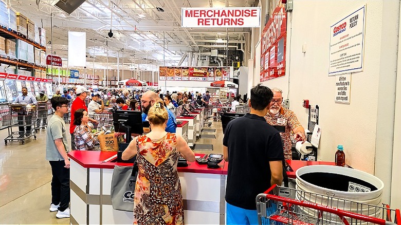 Customer queued up at one of Costco's return booths
