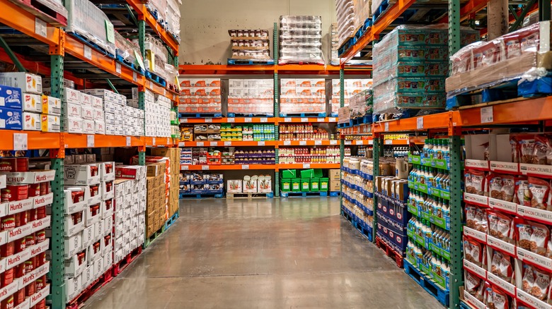 The view of an aisle inside of a Costco wholesale outlet