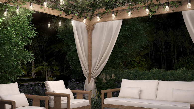 Costco's outrdoor solar string lights installed above a seating area