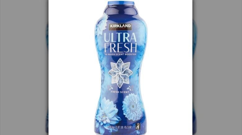 A blue bottle of Kirkland Ultra Fresh scent boosters against a white background