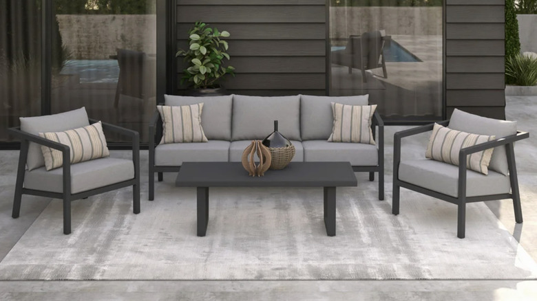 A simple gray and black patio seating set