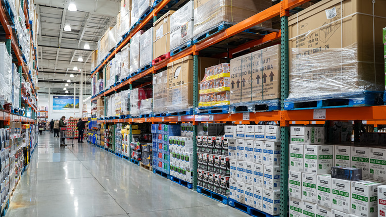An interior of a Costco, with large aisles mostly empty.