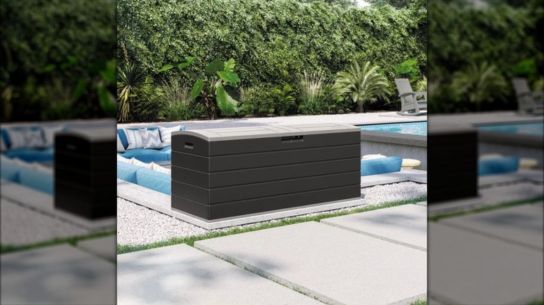 Suncast deck box by pool