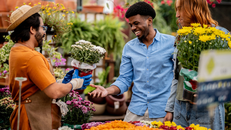 People shopping for flowers