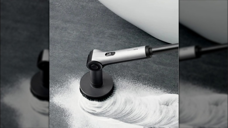 spin scrubbing being used to clean flooring