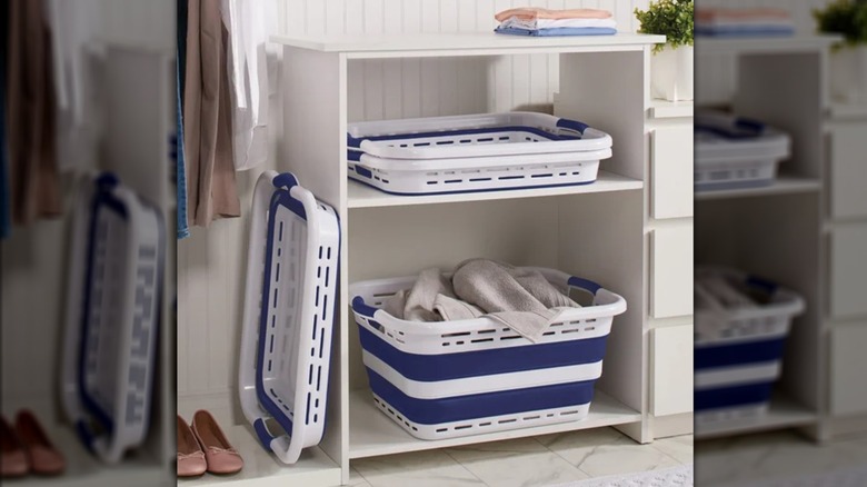 shelf containing open and closed collapsible laundry baskets