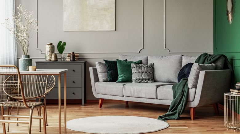 Gray couch in gray room