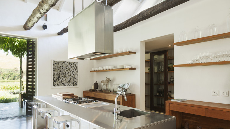 Large kitchen with stainless steel covered island