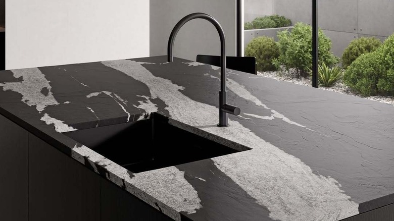 Kitchen with marble-like Neolith countertops and backsplash