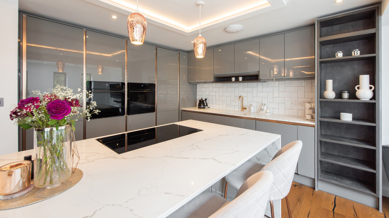Decorated kitchen with porcelain countertops
