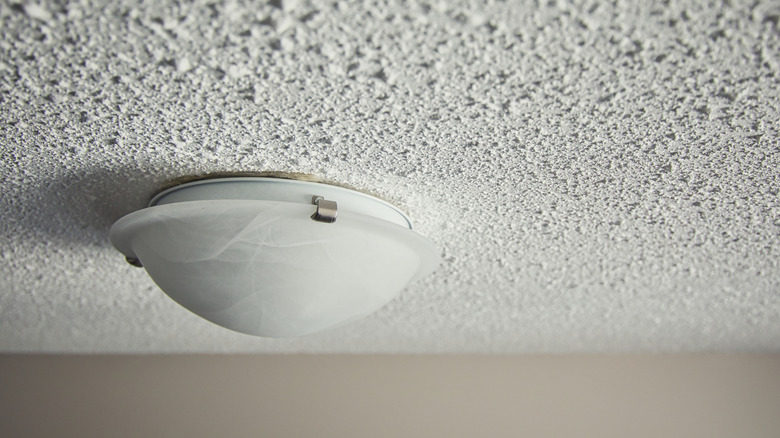 Popcorn ceiling with light fixture