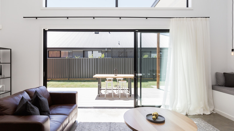 sliding glass door with shades