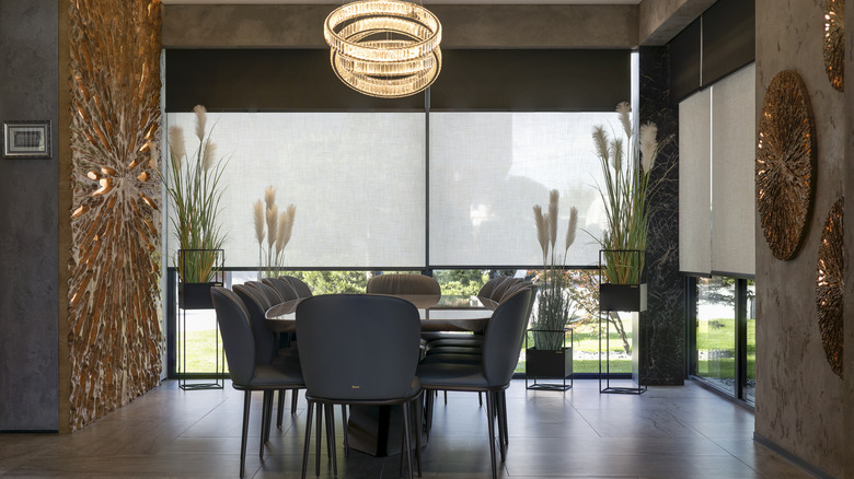 Dining room with sheer solar roller blinds