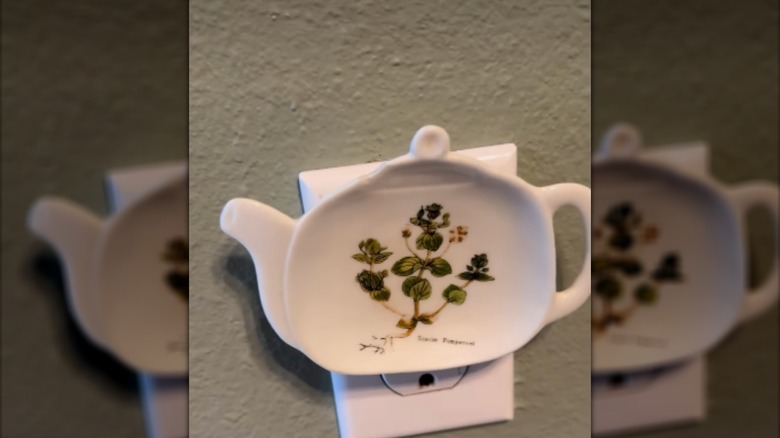 DIY outlet cover using thrifted trinket dish