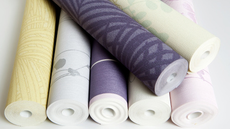 A pile of wallpaper rolls.
