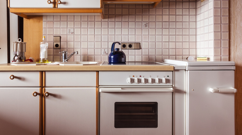 An all white vintage kitchen.