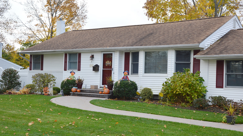 White siding ranch style home