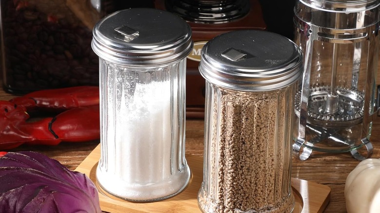 Retro glass shakers filled with sugar and coffee
